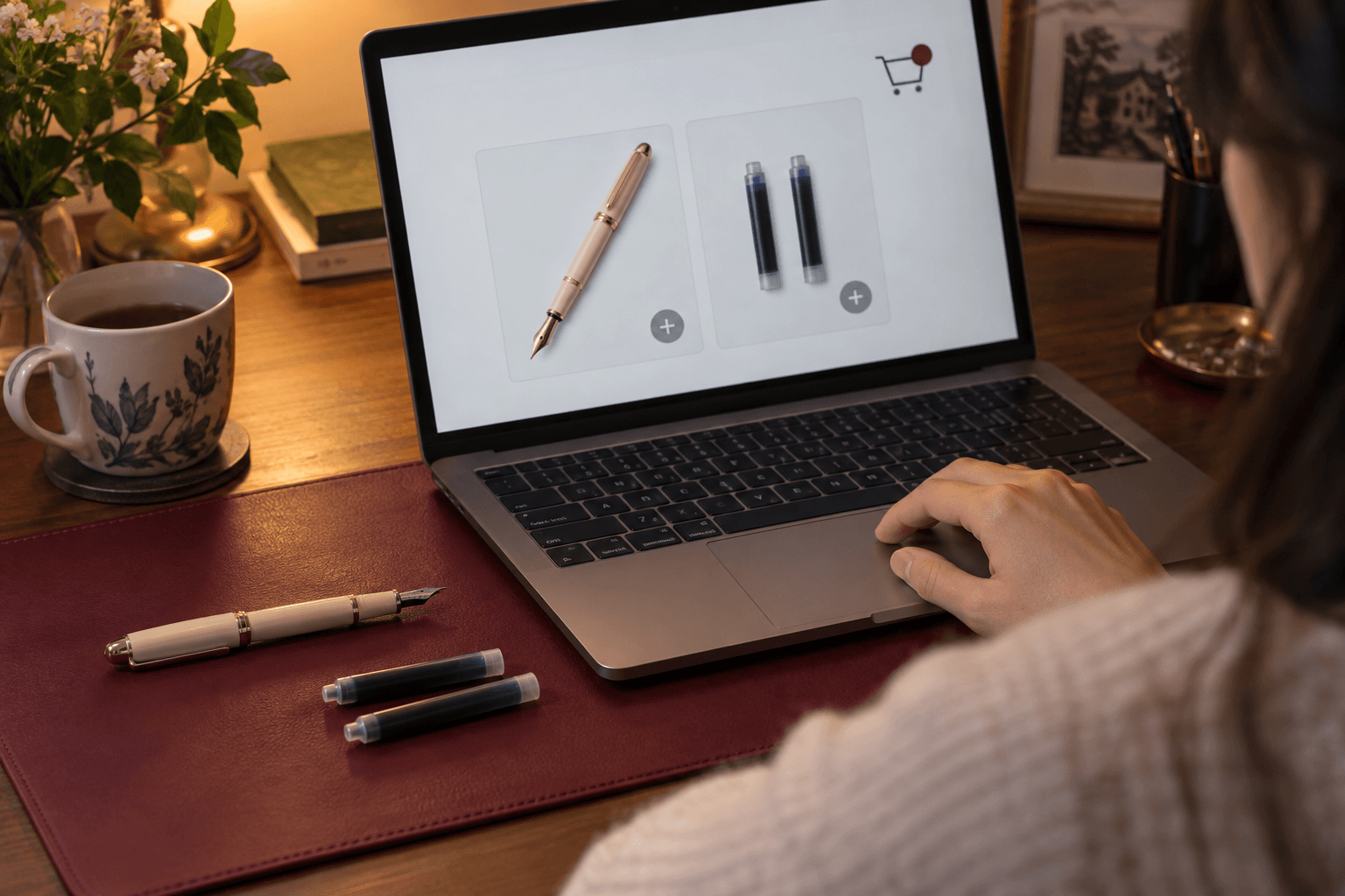 An online shopper considers matching ink cartridges as an add-on to a fountain pen